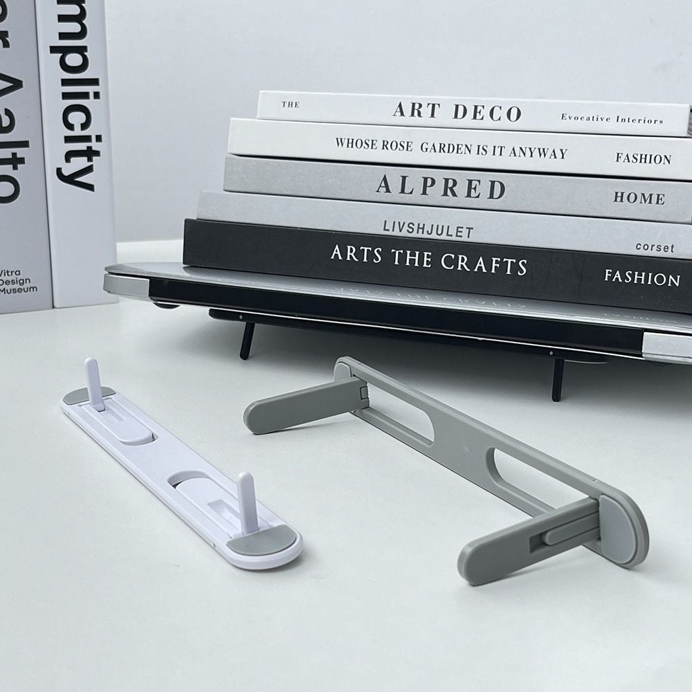 Laptop Stand Riser - حامل لابتوب غير مرئي قابل للطي